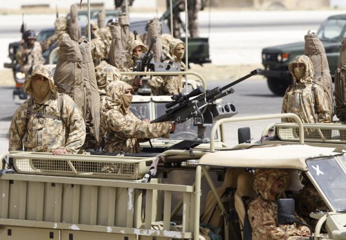 Jordanian special forces take part in a parade at the opening of the Special Operation Forces Exhibition (SOFEX)