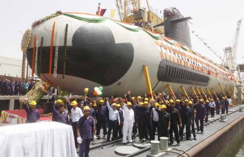 Mumbai, India - April 6, 2015:Workers during floating out event of the first project 75 (Scorpene) Submarine on pontoon at Mazagaon Dockyard Limited in Mumbai, India, on Monday, April 6, 2015.  (Photo by Pratham Gokhale/ Hindustan Times)
