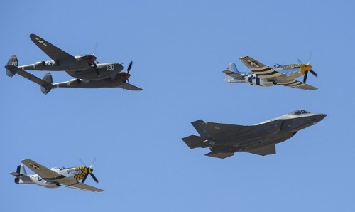 Two P-51 Mustangs, an F-35 Lightning II and a P-38 Lightning fly in formation during the 2016 Heritage Flight Training and Certification Course at Davis-Monthan Air Force Base, Ariz., March 5, 2016. Established in 1997, the HFTCC certifies civilian pilots of historic military aircraft and U.S. Air Force pilots to fly in formation together during the upcoming air show season. (U.S. Air Force photo by Airmen 1st Class Ashley N. Steffen/Released)
