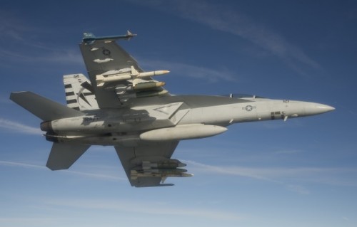 An F/A-18F Super Hornet assigned to the Salty Dogs of Air Test and Evaluation Squadron (VX) 23 conducts a captive carry flight test of an AGM-88E Advanced Anti-Radiation Guided Missile at Naval Air Station Patuxent River, Md. (U.S. Navy photo by: Greg L. Davis)