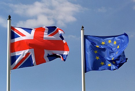 ARA92B A United Kingdom flag flying next to a European Union flag