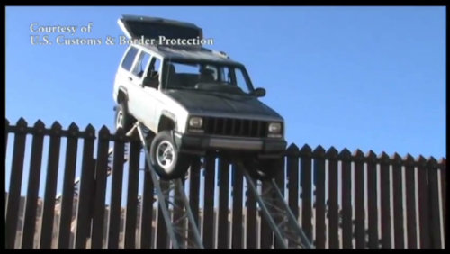 smugglers-jeep-stuck-on-border-fence-00000413-horizontal-large-gallery