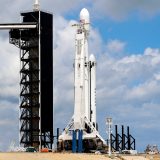A SpaceX Falcon Heavy rocket with the Arabsat 6A communications satellite aboard is prepared for launch later in the day at the Kennedy Space Center in Cape Canaveral